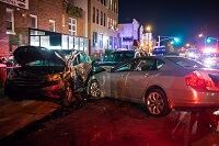 Two wrecked cars at a vehicular manslaughter scene